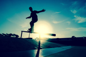 Skateboarder riding a rail