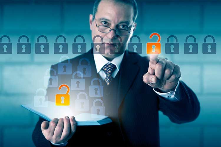 image of businessman in front of touchscreen selecting from a row of locks